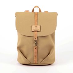 "Introducing the perfect accessory for eco-conscious fashionistas--a stunning Sustainable Fabric Backpack crafted with both style and the environment in mind. This Vegan Canvas Rucksack is not just a bag; it's a statement of your commitment to sustainability. Carefully designed, our Recycled Material Backpack incorporates recycled materials and features cork details, making it an ideal choice for the eco-conscious woman with a flair for fashion. Whether you're exploring the city, embracing outdo Eco-friendly Canvas Backpack For Everyday Use, Eco-friendly Everyday Backpack In Natural Color, Eco-friendly Canvas Backpack For Travel, Eco-friendly Backpack For Everyday Use, Eco-friendly Brown Backpack For Everyday, Eco-friendly Everyday Brown Backpack, Everyday Eco-friendly Brown Backpack, Eco-friendly Brown Everyday Backpack, Fabric Backpack