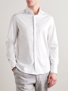 In the hands of Brunello Cucinelli, even something as simple as a plain white shirt feels luxurious. Made from soft cotton-jersey, this one is tailored with a spread collar that looks good whether you wear it as part of a business-casual outfit or in a more laid-back way. Plain White Shirt, Brunello Cucinelli Men, White Shirt Men, Tuxedo Shirts, Armani Men, Business Casual Outfits, White Shirts, Formal Shirts, Plain White