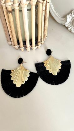 Beautiful boho statement black and gold tassel earrings.  7cm long  Lightweight. Black Tassel Drop Earrings, Black Fringe Tassel Drop Earrings, Chic Tassel Earrings For Party, Chic Tassel Earrings, Chic Evening Earrings With Tassels, Black Fringe Drop Earrings, Black Tassel Party Jewelry, Black Tassel Jewelry For Party, Black Fringe Dangle Earrings