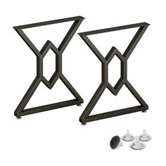 pair of black metal table legs with geometric design