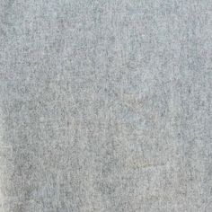 an image of a gray background that looks like it is made out of felt or wool