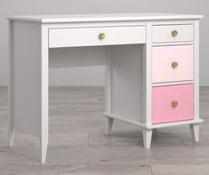 a pink and white desk with two drawers