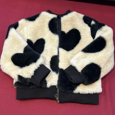 Splendid Faux Fur Jacket. Never Worn. New With Tags. Size 2. Cream With Black Heart Pattern. Cute Cream Winter Outerwear, Cute Cream Outerwear, Cute Cream Long Sleeve Outerwear, Cute Black Winter Outerwear, Cute Black Outerwear For Winter, Casual Long Sleeve Heart Print Outerwear, Heart Fur Coat, Black Hearts, Heart Pattern