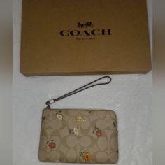 Coach Corner Zip Wristlet In Signature Canvas With Nostalgic Ditsy Print. Gold/Light Khaki. Bnwt. Brand New With Tags. Nwt. New With Tags. Signature Coated Canvas And Smooth Leather. Two Credit Card Slots. Zip-Top Closure. Fabric Lining With Wrist Straps Attached. Corner Zip Wristlet In Signature Canvas With Nostalgic Ditsy Print. 100% Authentic. Super Cute! Absolutely No Returns So Please Pay Attention To Pics. I Am Not A Professional Tailor Please Pay Attention To Measurement Pics. Smoke Free Beige Rectangular Wristlet For Spring, Rectangular Beige Wristlet For Spring, Spring Coach Rectangular Wristlet, Coach Rectangular Leather Wristlet, Coach Medium Corner Zip Wallet, Spring Rectangular Coach Wristlet, Coach Spring Rectangular Wristlet, Coach Corner Zip Wristlet, Brown Coach Wristlet Pouch