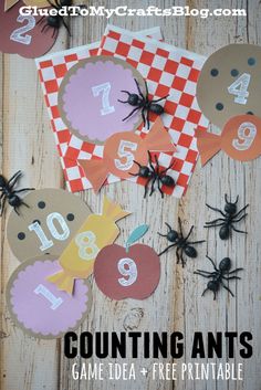 halloween themed counting ants game with free printables for kids to play on the table