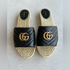 Gucci Marmont Pilar Gg Quilted Leather Espadrilles Slides In Black Quilted Smooth Leather With Antique Gold-Tone Gg Logo And A Beige Espadrille Sole Size Eu 39.5 Equivalent To Us 9.5 Per Gucci Website. Slip-On Style Nappa Leather Quilted Upper Iconic Bronze-Tone Interlocking Gg Logo Accent On Top Of Foot Leather Lining Rubber Outsole Rope Insole With Leather Heel Lining Round, Open Toe Low Platform Approx. 1" Good Pre Owned Condition. Minor Signs Of Wear And Marking On Foot- Beds, Signs Of Wear Beige Espadrilles, Gucci Slides, Espadrilles Slides, Gucci Marmont, Gg Logo, Leather Espadrilles, Gg Marmont, Black Quilt, Gucci Black