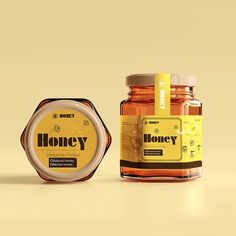 two jars of honey sitting next to each other on a yellow background with a label that says honey