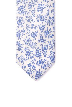 Complete your special occasion with this beautiful floral print necktie. Vibrant floral motifs entwine and cascade down this romantically fun cotton tie. 100% Cotton 58" long and 2.5" wide Slim Tie Parquet Top quality fabric Imported Elegant Floral Print Ties For Spring, White Neckwear With Ties For Spring, White Ties Neckwear For Spring, Elegant Cotton Neckwear With Ties, Elegant Patterned Tie With Floral Print, Formal Floral Print Ties For Spring, Formal Spring Floral Print Ties, Spring Floral Print Formal Ties, Floral Print Ties For Spring Formal Events