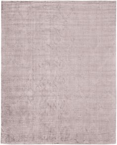 an area rug with a light purple color