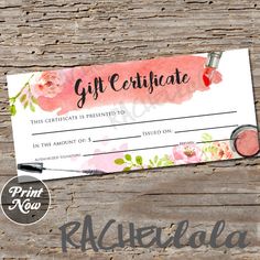 a gift certificate sitting on top of a wooden table