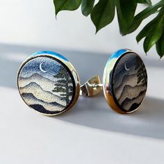 Mountain Moon Stud Earrings | Silver Stud Earrings | Hypoallergenic Post Earrings | Perfect Gift for Friend or Daughter Embrace the serene beauty of nature with our Mountain Moon Stud Earrings. These stunning earrings are meticulously crafted from high-quality silver, capturing the ethereal charm of moonlit mountains. The intricate design features a delicate mountain range, with a shimmering moon hanging above, making it a perfect accessory for nature lovers and adventurers alike. Our Mountain M Hypoallergenic Moon-shaped Earrings For Gift, Hypoallergenic Moon Shaped Earrings Gift, Moon Hanging, Moon Stud Earrings, Earrings Hypoallergenic, Stud Earrings Gold, Moon Studs, Gift For Daughter, Silver Stud Earrings