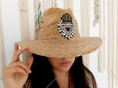 I love Mexico celebrates the native crafts of Mexico and the artists that produce them, enabling them and their communities to get recognized for their talented work and achieve economic stability for their families. This listing is for one piece of this beautiful handmade straw hats. They are prefect to add to your closet for your favorite dress, providing shade from the warm summer sun. The eye decoration is hand embroidered. You will get the exact same piece shown on the pictures. These produ Traditional Straw Hat For Summer Rodeo, Adjustable Curved Brim Straw Hat As Gift, Adjustable Bohemian Palm Leaf Hat, Bohemian Adjustable Sun Hat Gift, Adjustable Bohemian Sun Hat As Gift, Traditional Handmade Straw Hat For Festival, Handmade Traditional Straw Hat For Festivals, Handmade Straw Hat With Curved Brim For Festivals, Handmade Curved Brim Straw Hat For Festivals