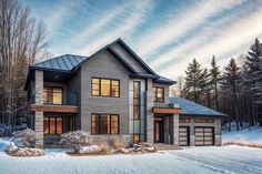 a house in the snow with lots of windows