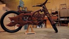 a wooden bike is on display in a shop