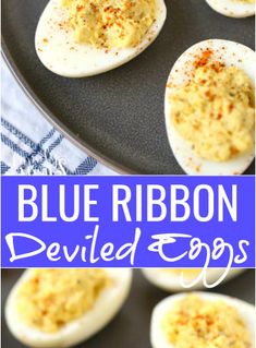 blue ribbon deviled eggs on a black plate