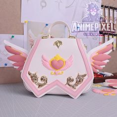 Find More Treasures➡️https://animepixelprint.etsy.com The Sakura Series handbag line features stunning anime designs inspired by Sailor Moon and Cardcaptor Sakura. Adorned with wings, hearts, and sakura flower patterns, these bags are crafted from eco-friendly vegan materials like silicone, gold metal, PU leather, and suede. 🌟 Beautiful Anime Designs: Inspired by Sailor Moon and Cardcaptor Sakura, featuring intricate motifs like wings, hearts, and sakura flowers. 🌿 Eco-Friendly Materials: Made from vegan silicone, gold metal, PU leather, and suede, ensuring a sustainable yet luxurious feel. 🎁 Perfect Gift Set: An ideal gift for yourself or a loved one, suited for everyday use, special occasions, and cosplay events. 👜 Versatile Use: Designed for practicality and style, perfect for carry Animecore Fashion, Sailor Moon Accessories, Sailor Moon Bag, Japanese Handbag, Anime Gamer, Moon Accessories, Sakura Card Captor, Anime Designs, Drawing Hair Tutorial