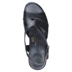 This sleek and elegant dress sandal has an elevated wedge sole and intricate design. Ample soft leather straps overlap to wrap the foot in comfort. A contoured insole follows the natural shape of the foot for support, while a flexible wedge heel offers shock-absorption. An adjustable back strap gently holds the heel in place. Heel Height: 1.50" Initial fit should allow the foot to settle naturally into the sandal. The heel strap should be adjusted so the backstrap rests comfortably against the s Gently Holds, Sas Shoes, Natural Shapes, Dress Sandals, Back Strap, Elegant Dress, Strap Heels, Mary Jane Sneaker, Wedge Heels