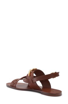 A chunkier take on the label's signature VLOGO brings golden gleam to this strappy calfskin-leather sandal with subtle Grecian vibes. Adjustable strap with buckle closure Leather upper, lining and sole Made in Italy Designer Shoes Sandal Women, Tan Brown, Valentino Garavani, Leather Sandals, Designer Shoes, Calf Skin, Gate, Womens Sandals, Adjustable Straps