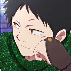 an anime character with black hair and green shirt holding a cell phone to his ear