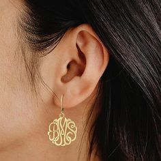 Elegant script lettering on these monogram earrings gives your style an extra personal touch. Initials will appear exactly as entered. Must be three letters, center initial will be enlarged.Back: LeverbackPersonalize: Initials will appear exactly as entered. Must be three letters, center initial will be enlarged.Features: Monogrammable, PersonalizedShape: RoundMetal Color: YellowEarring Length: 25mmEarring Width: 25mmCare: Wipe CleanEarrings Style: Drop EarringsMetal: 14k Gold Over SilverAssemb… Classic Personalized 14k Gold Earrings, Classic Personalized Round Earrings, Elegant Gold Earrings With Initials, Elegant Personalized Sterling Silver Earrings, Gold Earrings With Initials In 14k Gold, Classic Personalized Earrings For Anniversary, Personalized Classic Earrings For Anniversary, Custom Name Gold Sterling Silver Earrings, Classic Style Initials Earrings Perfect For Gifting