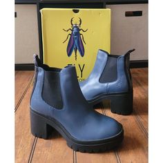 New With Tags And Box Fly London Tope Leather Chelsea Boots Size: 40 Color: Denim Dublin/ Blue Tope520fly P144520015 A Treaded Sole And Block Heel Lift This Classic Chelsea Boot Featuring Logo Detailing On The Pull Tab And A Cushioned Footbed. 3" Heel; 1 1/4" Platform Pull-On Style With Elastic Gore Insets Leather Upper/Synthetic Lining/Rubber Sole Please Note: The Original Box May Show Minor Wear And Tear. The Original Box Will Be Shipped Inside A Poly Mailer Due To Size. Blue Chelsea Boots, Grey Ankle Boots, Fly London Shoes, Wedge Ankle Boots, Poly Mailer, Fly London, Leather Chelsea Boots, Brown Ankle Boots, Suede Wedges