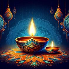 two lit candles sitting on top of a blue and orange flowered design with ornate ornaments