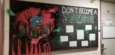 a bulletin board with zombie handprints on it and words don't become a zombie