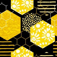 the honeycombs and flowers are painted in yellow on black background with grunge