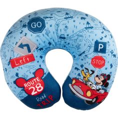 a blue neck pillow with mickey mouse on the front and disney's driving through town