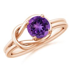 A velvety purple amethyst is prong set in 14k rose gold and draws attention to its immense luminosity. The lustrous band is finely twisted into an infinity knot, symbolizing eternal love and commitment. This amethyst knot ring has an elegant and sophisticated appeal. Infinity Knot Ring, February Birthstone Jewelry, Infinity Knot, Contemporary Ring, Knot Ring, February Birth Stone, Eternal Love, Amethyst Ring, Wedding Rings For Women