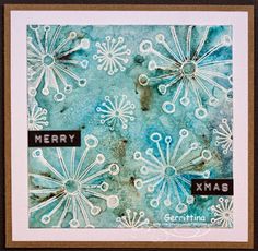 a close up of a card with snowflakes and words merry xmas on it