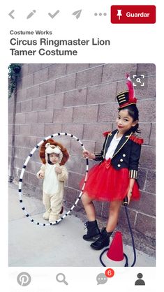 two children dressed in costumes standing next to each other