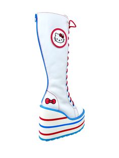 Detention Hello Kitty is a PRESALE item. It is expected to ship in late August. Please note that this estimated time frame is subject to change with out notice. Hello Kitty scene stompers! Made from an off white canvas upper with cute Hello Kitty embroidered details. Adorned with blue enamel eyelets and red waxed laces. Features a red white and blue striped EVA bottom. The detention has a platform height of 3 inches and a heel height of 6 inches. Hello Kitty Scene, Cute Hello Kitty, Closet Accessories, Cute Heels, Hello Kitty Items, High Top Vans, Embroidered Details, White Canvas, Platform Sneakers