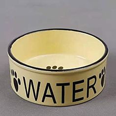 a dog bowl with the words water written in black and white on it's rim