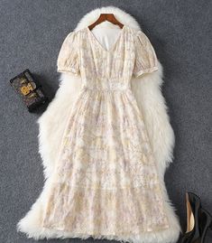 Elegant Chiffon Midi Dress With Puff Sleeves, Feminine V-neck Chiffon Dress For Garden Party, Spring Chiffon Midi Dress With Puff Sleeves, Elegant Beige Floral Print Chiffon Dress, Beige Floral Print Chiffon Dress, Casual Chiffon Floral Dress Knee-length, Feminine Floral V-neck Chiffon Dress, Beige V-neck Chiffon Dress, Beige Chiffon V-neck Dress