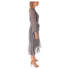 You're sure to love the look and feel of this stylish women's Maison Tara houndstooth printed wrap midi dress.Click on this WOMEN'S GUIDE to find the perfect fit and more! You're sure to love the look and feel of this stylish women's Maison Tara houndstooth printed wrap midi dress. Click on this WOMEN'S GUIDE to find the perfect fit and more! FEATURES Surplice neckline Zipper back 3/4-length balloon sleeves Elastic cuffs Partial elastic waistband with coordinating sash Ruffled hem Faux-wrap silh Surplice Neckline, Wrap Midi Dress, Modern Dress, Flowy Skirt, Balloon Sleeves, Fitted Bodice, Ruffle Hem, Stylish Women, Midi Length