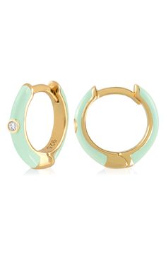 Easy-to-wear hoop earrings will add significant polish to even your most casual ensembles. 1/2" drop; 1/8" width Hinge with snap-post closure Sterling silver with goldtone plate/cubic zirconia Imported Huggie Hoop Earrings, Nordstrom Rack, Cubic Zirconia, Gold Tones, Hoop Earrings, Nordstrom, Sterling Silver, Silver, Green