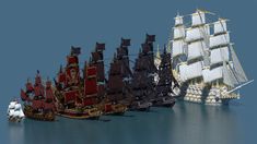 a group of ships that are floating in the water together, all with sails down