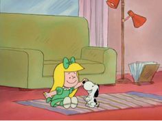 a cartoon girl playing with a dog in a living room