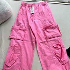 Light Weight Never Worn With Tags Great Spring Or Summer Pant Straight Leg Pink Baggy Cargo Pants, Baggy Pink Cargo Pants With Cargo Pockets, Pink Casual Parachute Pants With Multiple Pockets, Pink Baggy Cargo Style Bottoms, Casual Pink Parachute Pants With Cargo Style, Casual Pink Cargo Style Parachute Pants, Pink Relaxed Fit Parachute Pants With Side Pockets, Pink Wide Leg Utility Pants, Spring Wide Leg Parachute Pants With Side Pockets