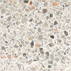 an image of a stone floor with different colors and shapes on it's surface