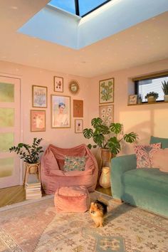 a living room filled with furniture and a skylight