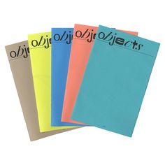 five different colored envelopes with writing on them