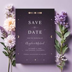 an elegant save the date card with purple flowers and greenery on a purple background