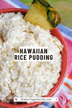 a red bowl filled with rice on top of a colorful table cloth and the words hawaiian rice pudding above it