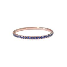 "This finely handcrafted ring is made completely of 14K solid gold and micro pavé set with genuine AAA quality round brilliant cut natural real Blue Sapphire gemstones. Perfect for stacking. ♦ Band Width: approximately 1.3mm ♦ Metal Finish: High Shine Polish ♦ This design is available in Rose, White and Yellow 14K Gold; also in 14K White Gold with Black Rhodium Plated Finish ♦ This item is proudly made in USA. *This piece comes in a Nana Bijou branded white leatherette jewelry gift box, along wi Stacking Bands, Eternity Band Ring, Handcrafted Rings, Natural Blue Sapphire, Black Rhodium, Eternity Band, Natural Sapphire, Sapphire Gemstone, Micro Pave