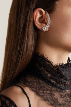 True to its name, Gucci's 'Flora' collection is inspired by nature. Crafted to elegantly hug the ear, this single earring is made from 18-karat white gold and features a row of shimmering diamond-studded leaves. Luxury Cubic Zirconia Ear Cuff For Formal Events, Luxury Cubic Zirconia Ear Cuff For Formal Occasions, Formal Fine Jewelry Cubic Zirconia Ear Cuff, Luxury Gucci Earrings For Evening, Formal Cubic Zirconia Ear Cuff Fine Jewelry, Gucci Luxury Evening Earrings, Luxury White Gold Ear Cuff For Anniversary, Luxury Ear Cuff For Anniversary, Elegant Silver Cubic Zirconia Ear Cuff