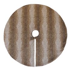 a brown and white pattern on the side of a round table cloth with holes in it