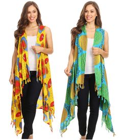 Light material with colorful Ankara inspired print. Made with pre-shrunk rayon. This poncho/ cardigan / top is the perfect accessory to wear over  solid garments, pair it with leather sandals for an effortless look! Casual Multicolor Outerwear For Beach, Casual Multicolor Beach Outerwear, Multicolor Graphic Print Outerwear For Summer, Bohemian Multicolor Outerwear For Vacation, Multicolor Cotton Outerwear For Summer, Multicolor Rayon Tops For Festival, Multicolor Long Outerwear For Vacation, Long Multicolor Outerwear For Vacation, Multicolor Shawl Outerwear For Spring