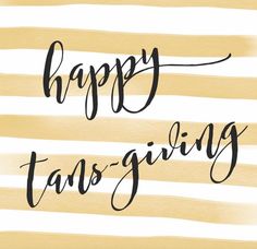 the words happy thanksgiving are written in black ink on a beige and white striped background